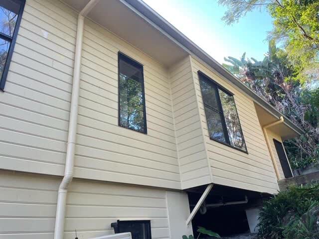 House exterior soft washing on the Sunshine Coast — after